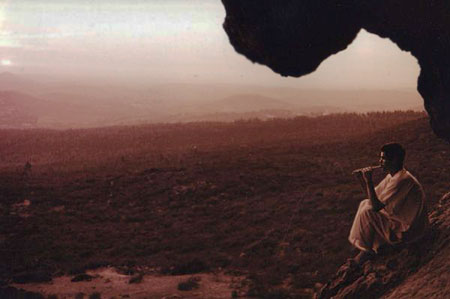 Mohamed El Attar plays at sunset in the Cave of Boujeloudia / Pan. - Click Here For More Photos! - Photo by Frank Rynne.